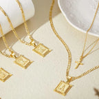 Set di Collana con Iniziale e Croce | Oro