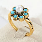 Anello Elegante in Perla Turchese con Fiori