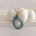 Collana in Perle di Conchiglia e Oro