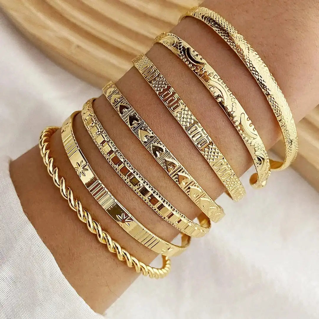 Set di Bracciali Resort in Oro Aperto