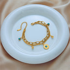 Bracciale a Catena Strato Elegante in Oro e Turchese