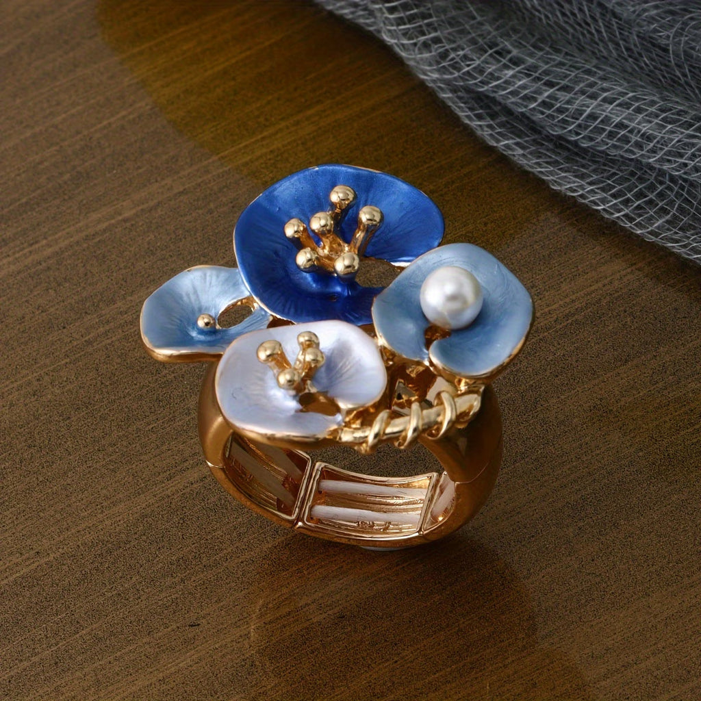 Anello dichiarativo regolabile con perle floreali blu