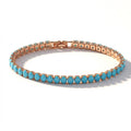 Bracciale Elegante in Oro e Turchese