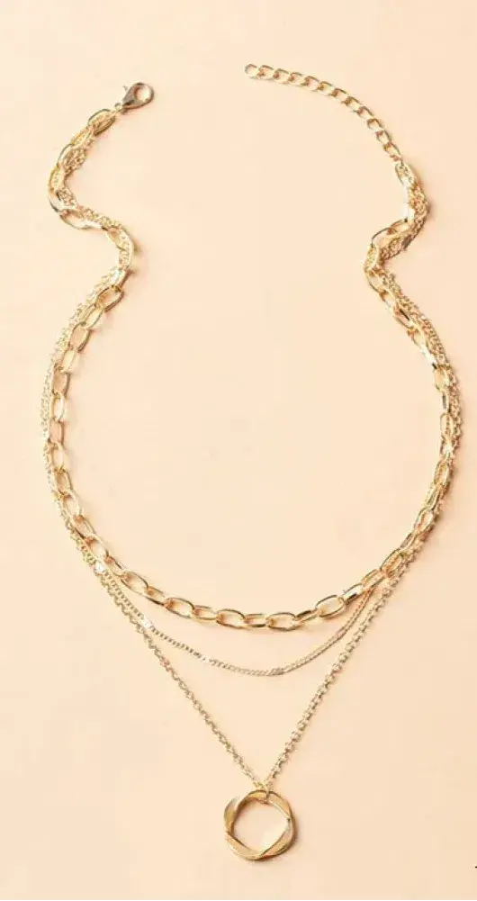 Collana vintage in oro con catena a strati e ciondolo